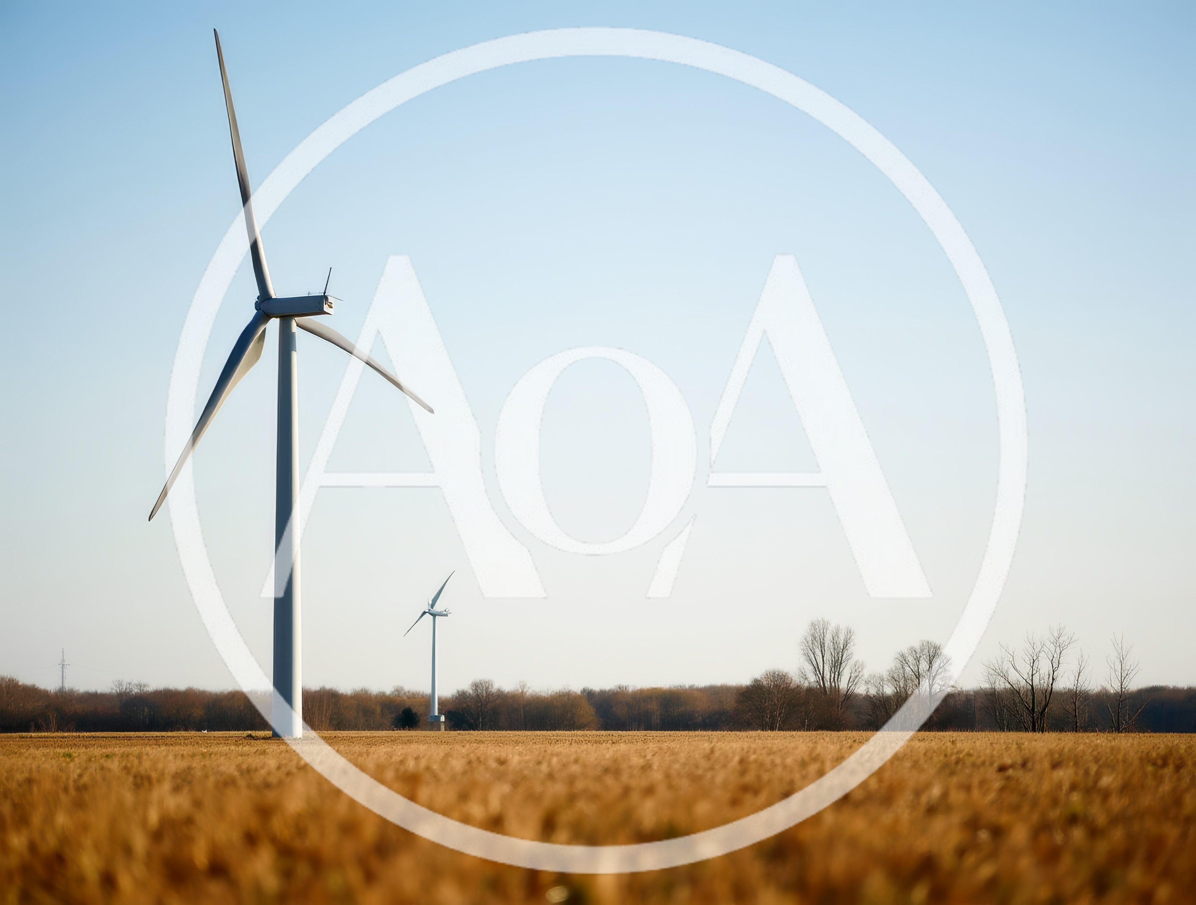 Wind Turbines Standing In A Harvested Agricultural Field