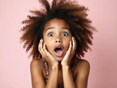 Surprised Young Girl With Curly Hair