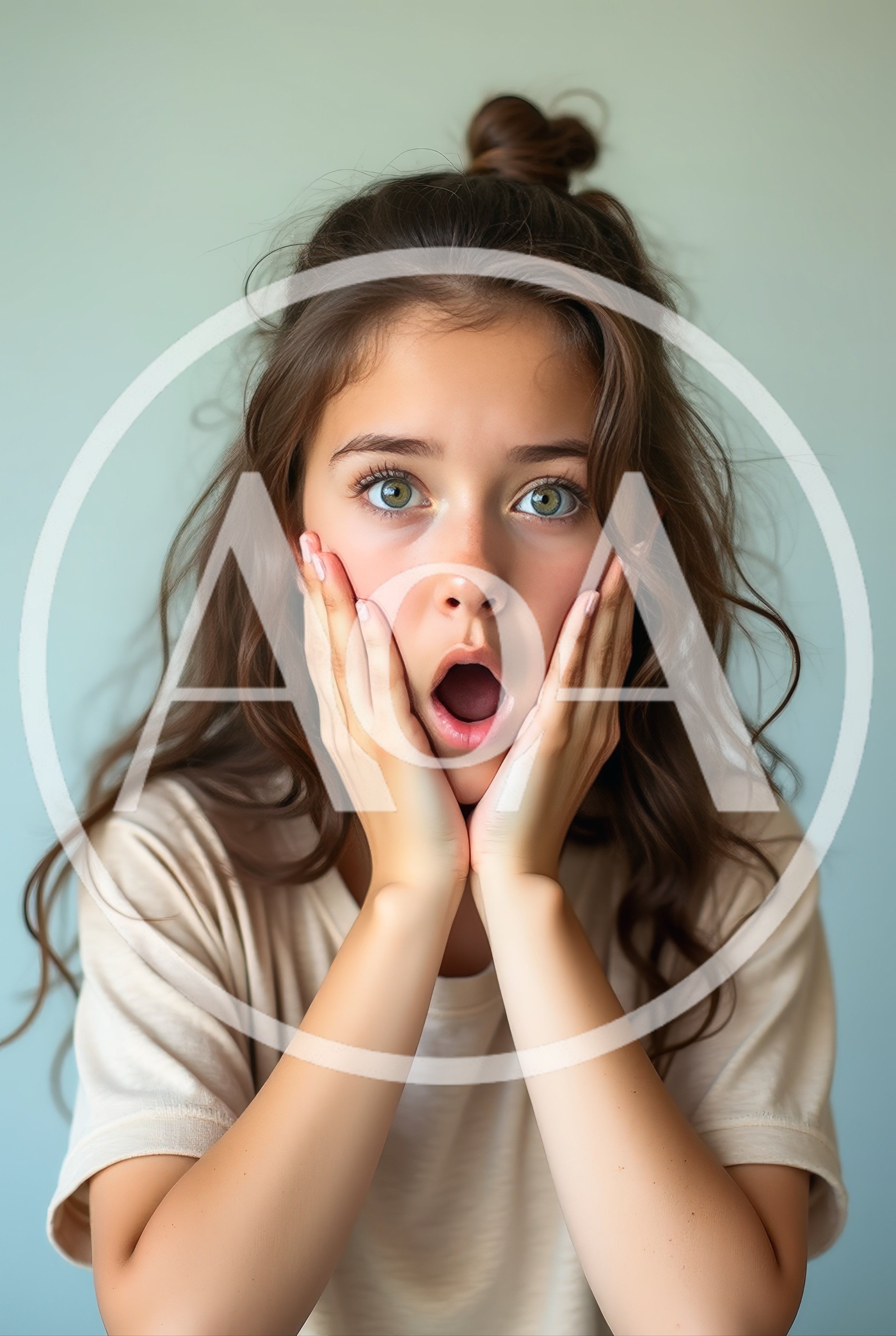 Surprised Young Woman With Hands On Her Cheeks