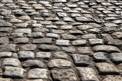 Close Up View Of Traditional Cobblestone Street Surface