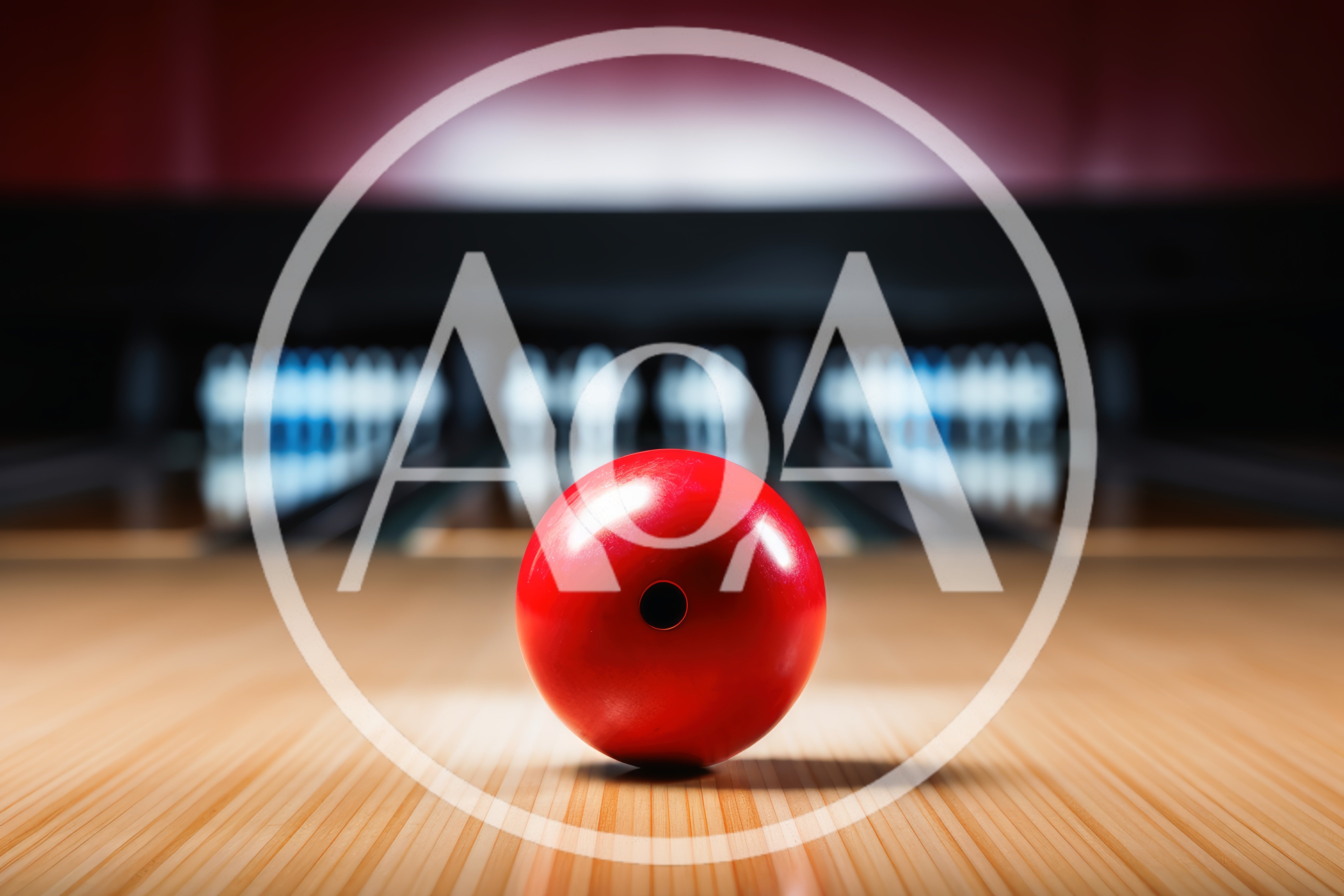 Red Bowling Ball Resting On A Wooden Lane