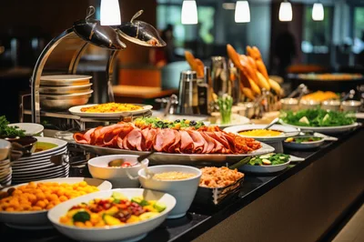 Gourmet Buffet Spread With Sliced Meats And Salads