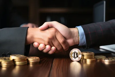Business Partners Shaking Hands Over Bitcoin Coins