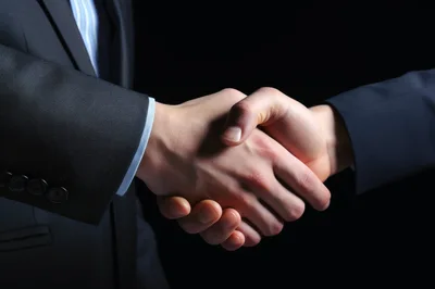 Professional Business Handshake Between Two Men