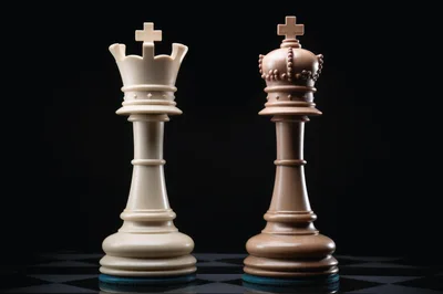White Queen and Brown King Chess Pieces