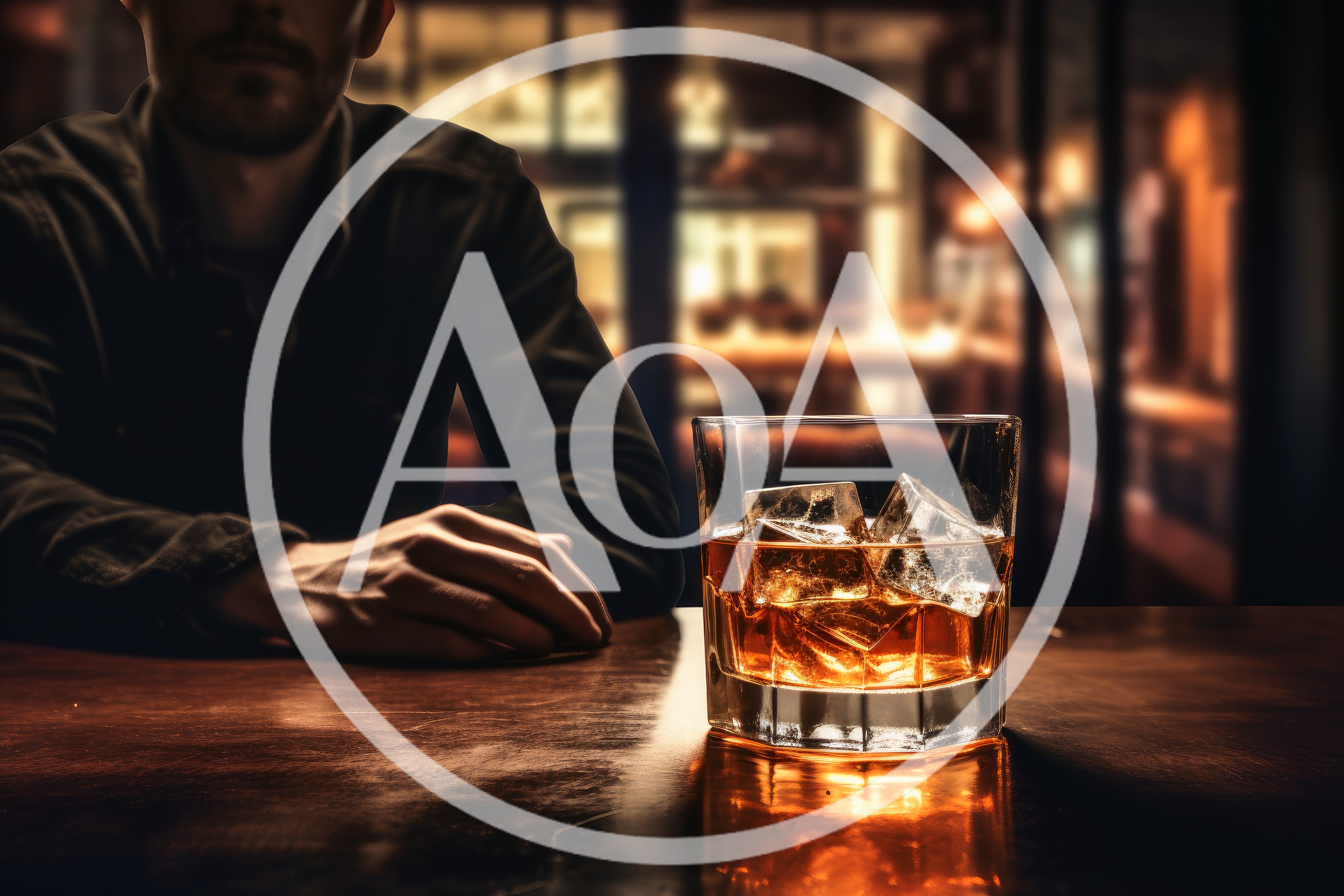 Man Sitting At Bar With Whiskey Glass