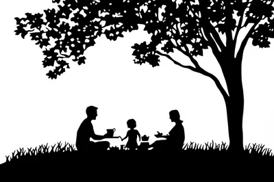 Silhouette Of A Family Having A Picnic Under A Tree