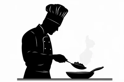 Silhouette Of A Professional Chef Cooking In A Kitchen