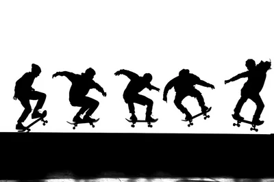 Silhouette Sequence Of A Skateboarder Performing A Trick