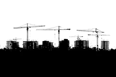 Construction Site Silhouette With Tower Cranes And Buildings