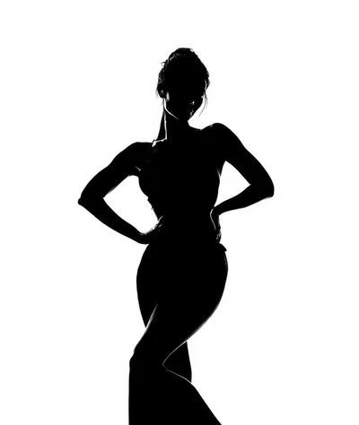 Silhouette Of A Woman Posing With Hands On Hips