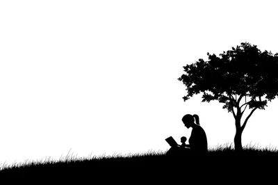 Silhouette of a Mother Reading to Her Child