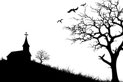 Silhouette Of A Church And Bare Tree At Sunset