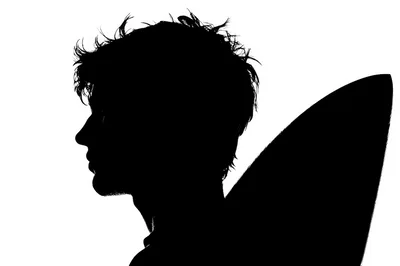 Silhouette Profile Of A Young Man With Wings