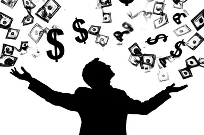 Silhouette Of A Businessman Celebrating Financial Success