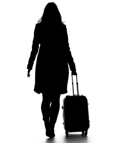 Silhouette Of A Woman Walking With A Suitcase