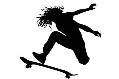 Silhouette Of A Skateboarder Performing An Aerial Trick