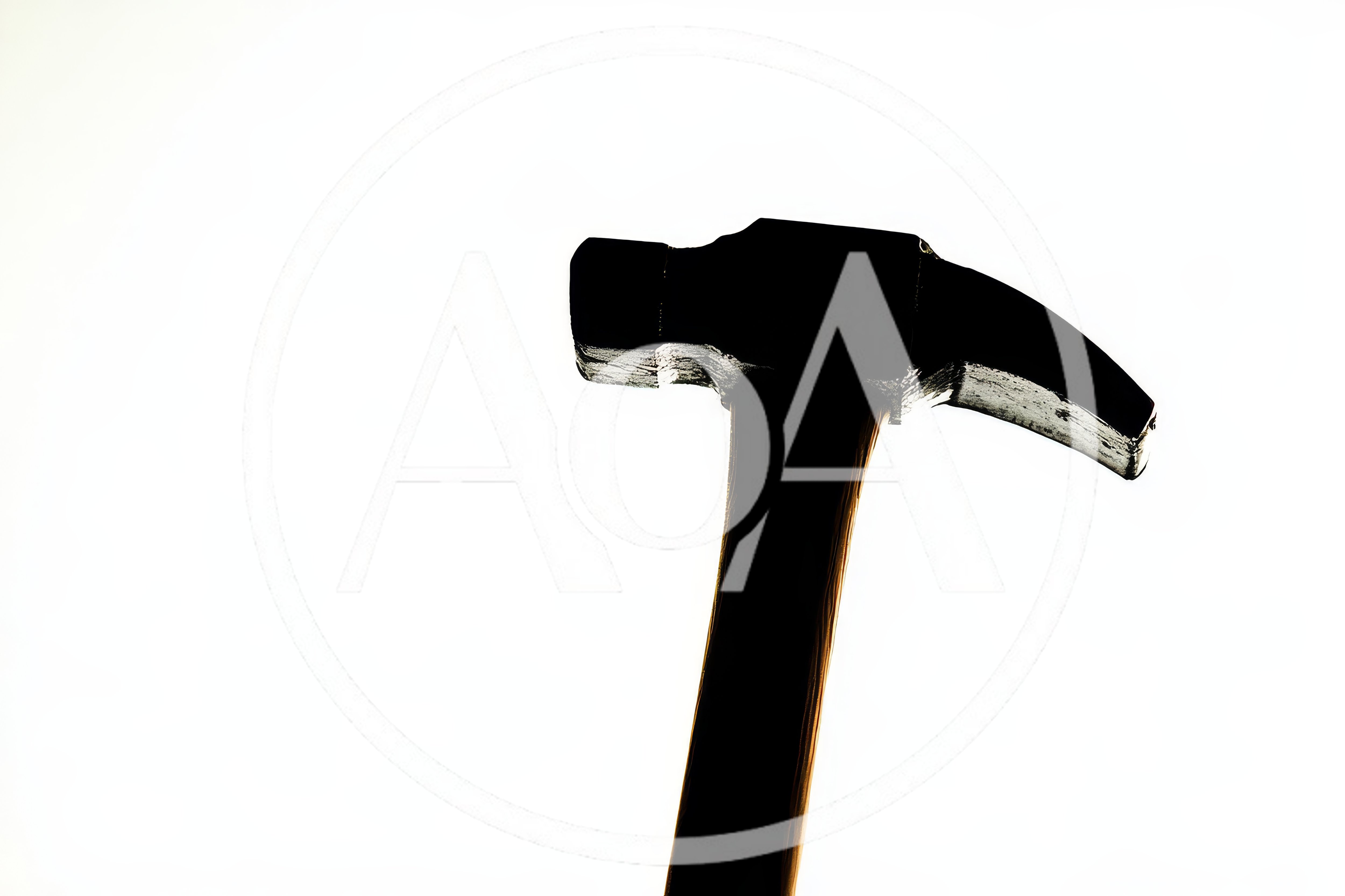 Silhouette Of A Claw Hammer Against White Background