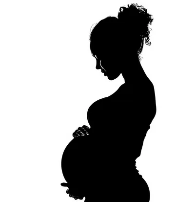 Silhouette Of A Pregnant Woman Holding Her Belly