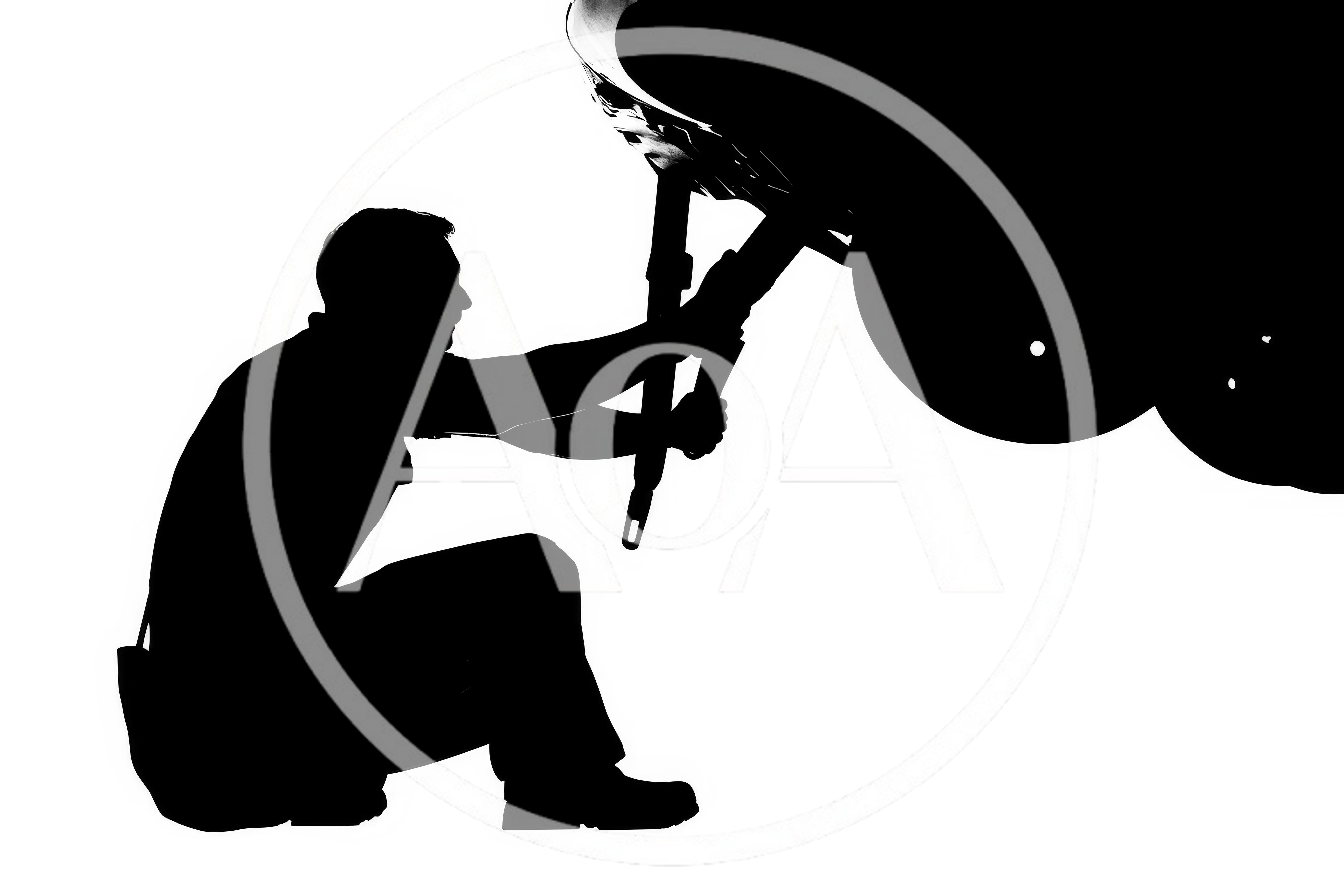 Silhouette Of A Mechanic Working On A Car