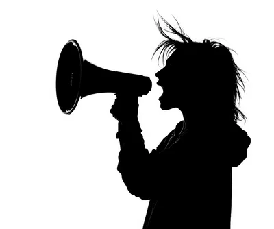 Silhouette Of A Person Shouting Into A Megaphone