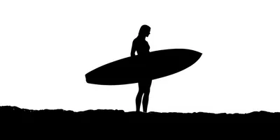 Silhouette Of A Surfer Holding A Surfboard