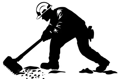 Silhouette Of A Construction Worker Using A Sledgehammer