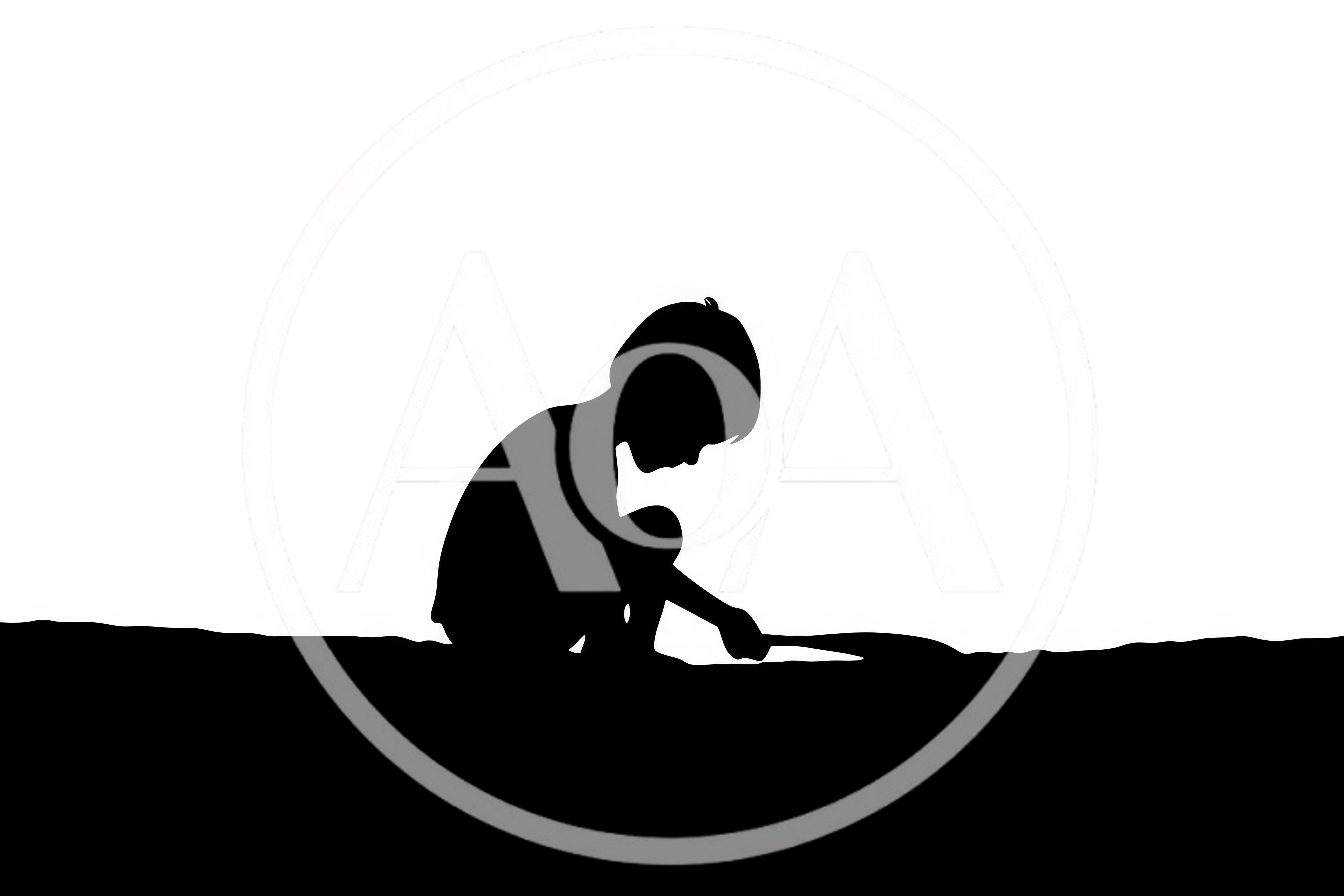 Silhouette Of A Child Playing In The Sand