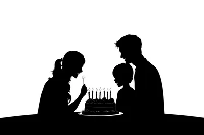 Silhouette Of A Family Celebrating A Birthday