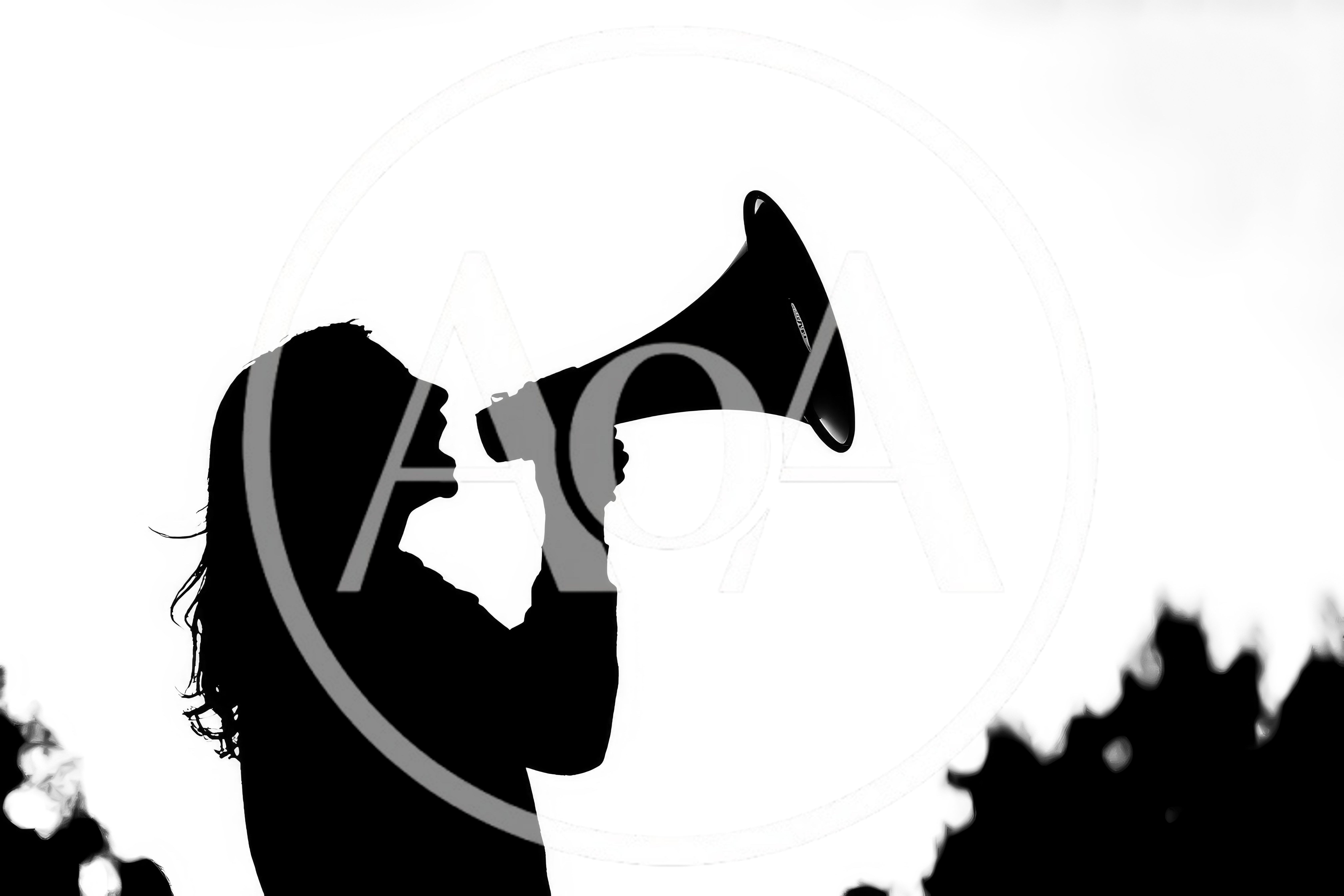 Silhouette Of A Woman Using A Megaphone