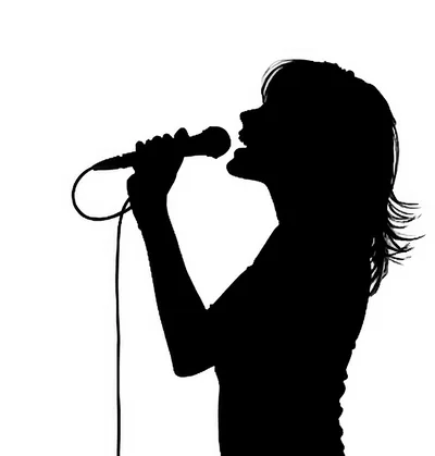 Silhouette Of A Woman Singing Into A Microphone