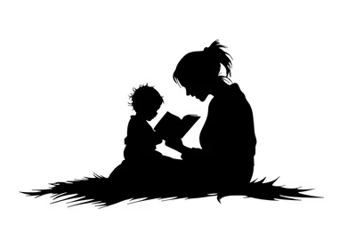 Silhouette Of A Mother Reading To Her Child