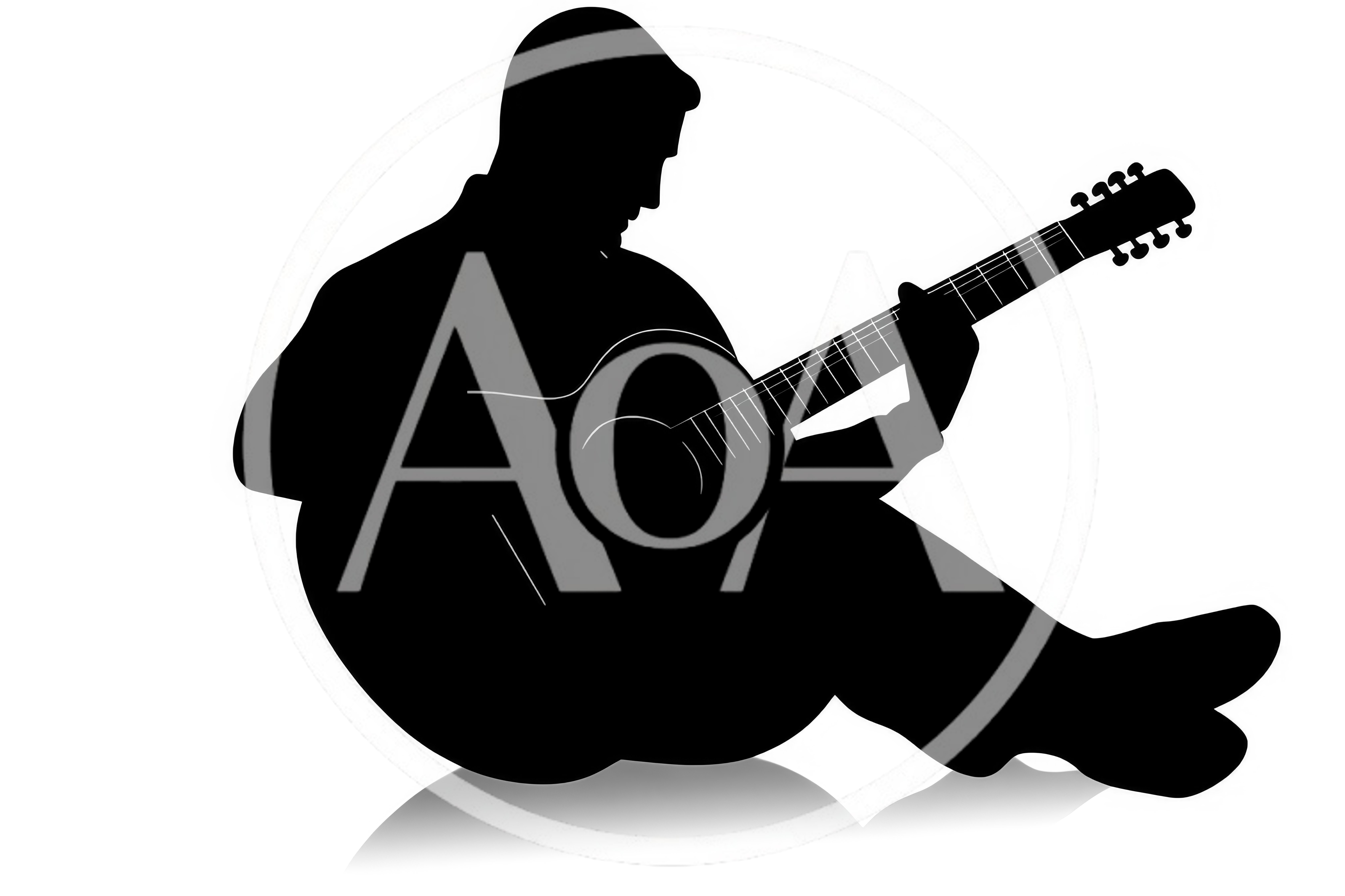 Silhouette Of A Man Playing Acoustic Guitar