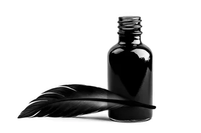 Black Ink Bottle With A Feather Quill