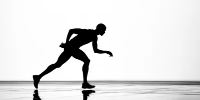 Silhouette Of A Male Sprinter Starting A Race