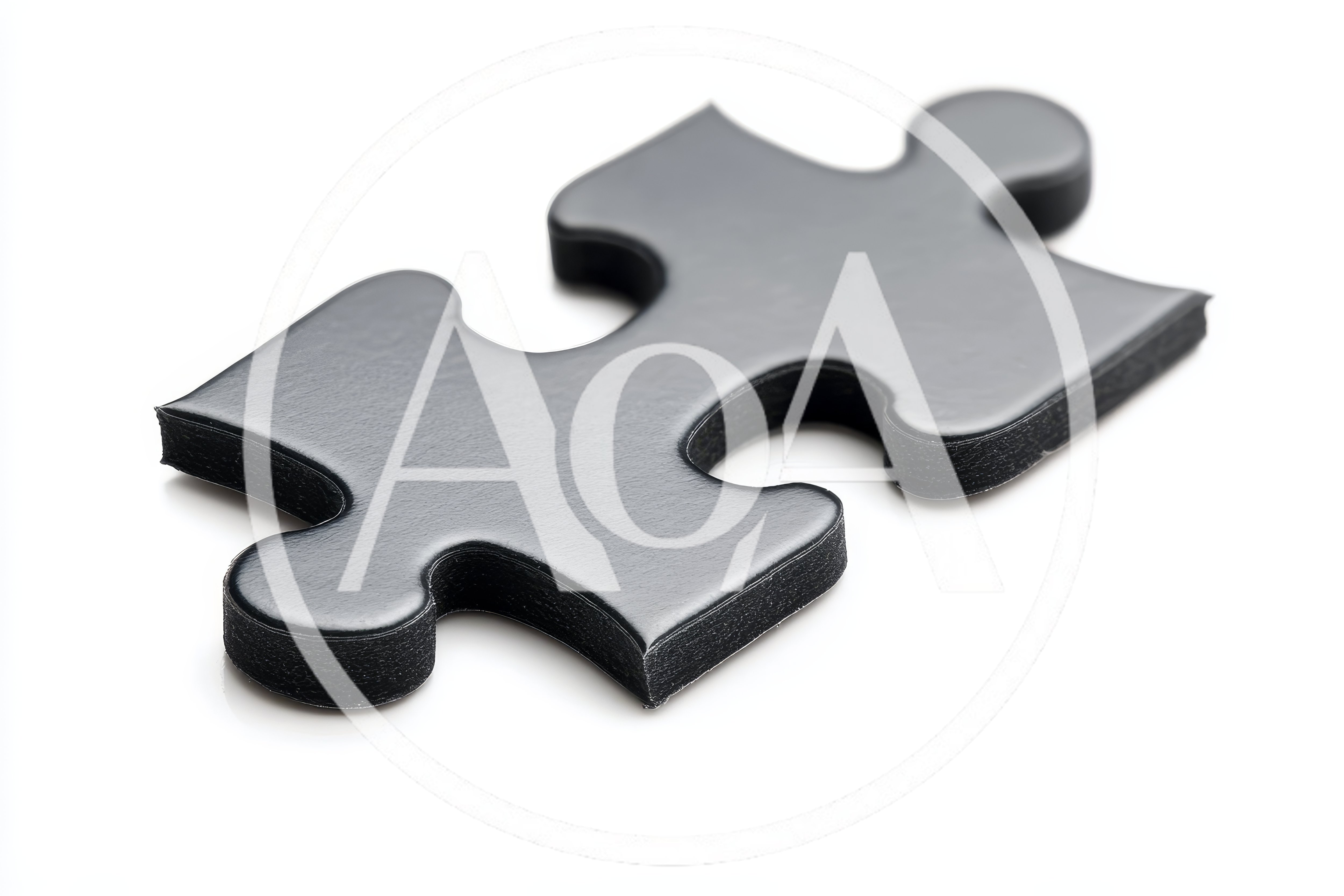 Single Black Jigsaw Puzzle Piece on White Background