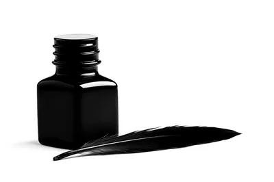 Black Ink Bottle And Quill Pen On White Background