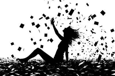 Silhouette Of A Woman Surrounded By Falling Paper Cards