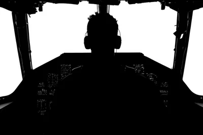 Silhouette Of A Pilot In A Cockpit