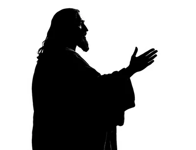 Silhouette Of Jesus Christ With Hand Raised In Blessing