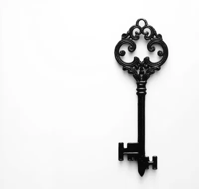 Ornate Black Skeleton Key On White Background