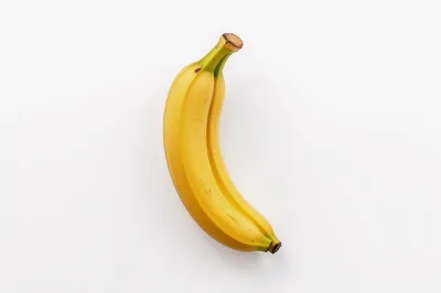 Two Fresh Yellow Bananas Joined Together