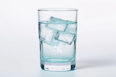 Glass Of Sparkling Water With Ice Cubes