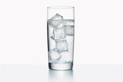 Glass Of Sparkling Water With Ice Cubes