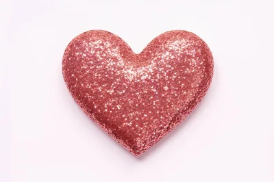 Glittering Red Heart Shape On Pink Background