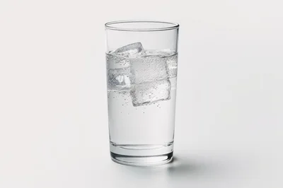 Glass Of Sparkling Water With Ice Cubes