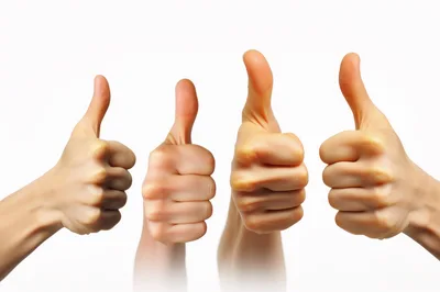 Four Hands Giving Thumbs Up Gestures