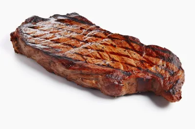 Grilled New York Strip Steak Isolated on White