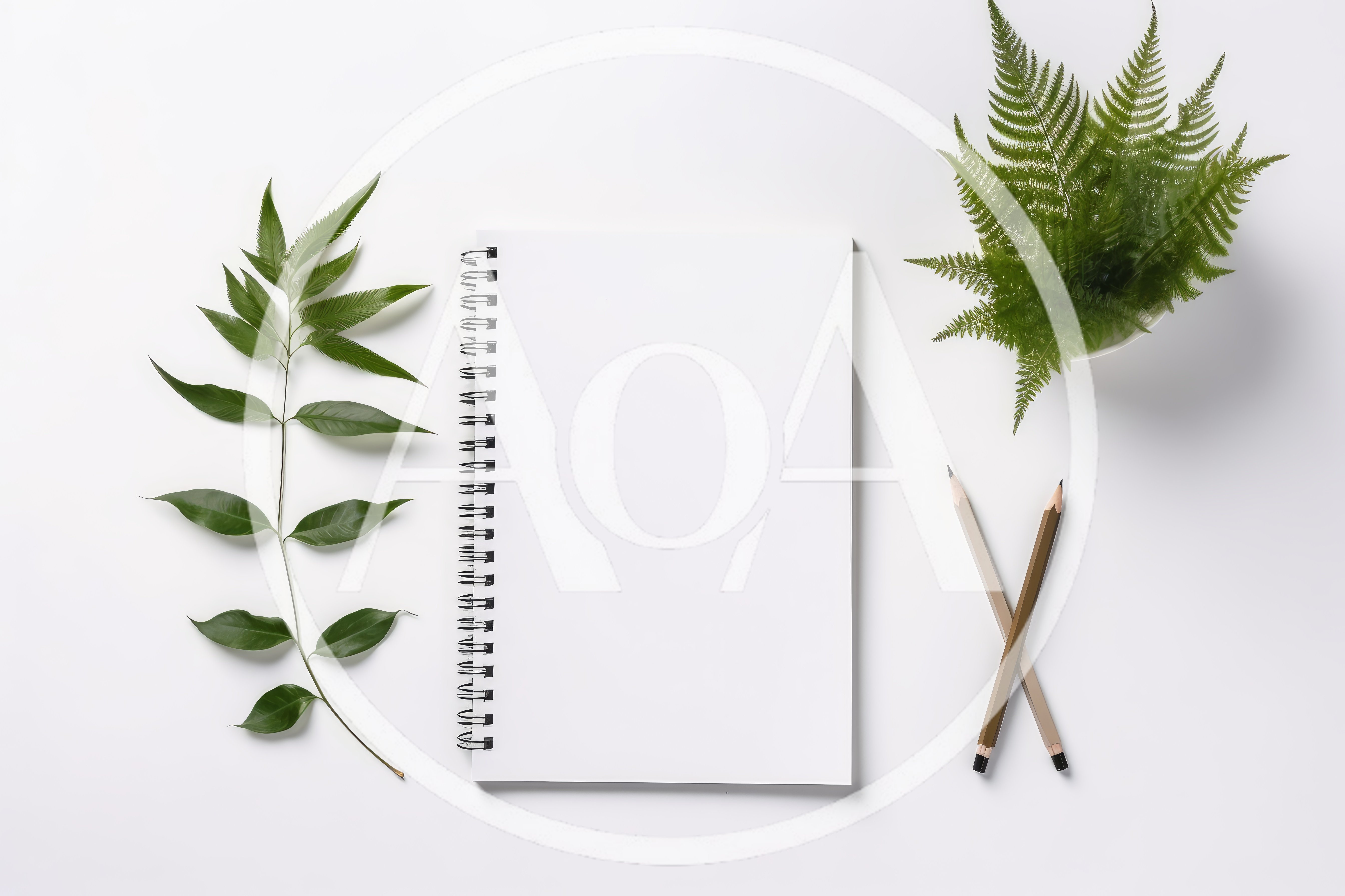 Blank Spiral Notebook With Green Leaves And Pencils