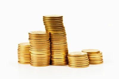 Four Stacks Of Shiny Gold Coins
